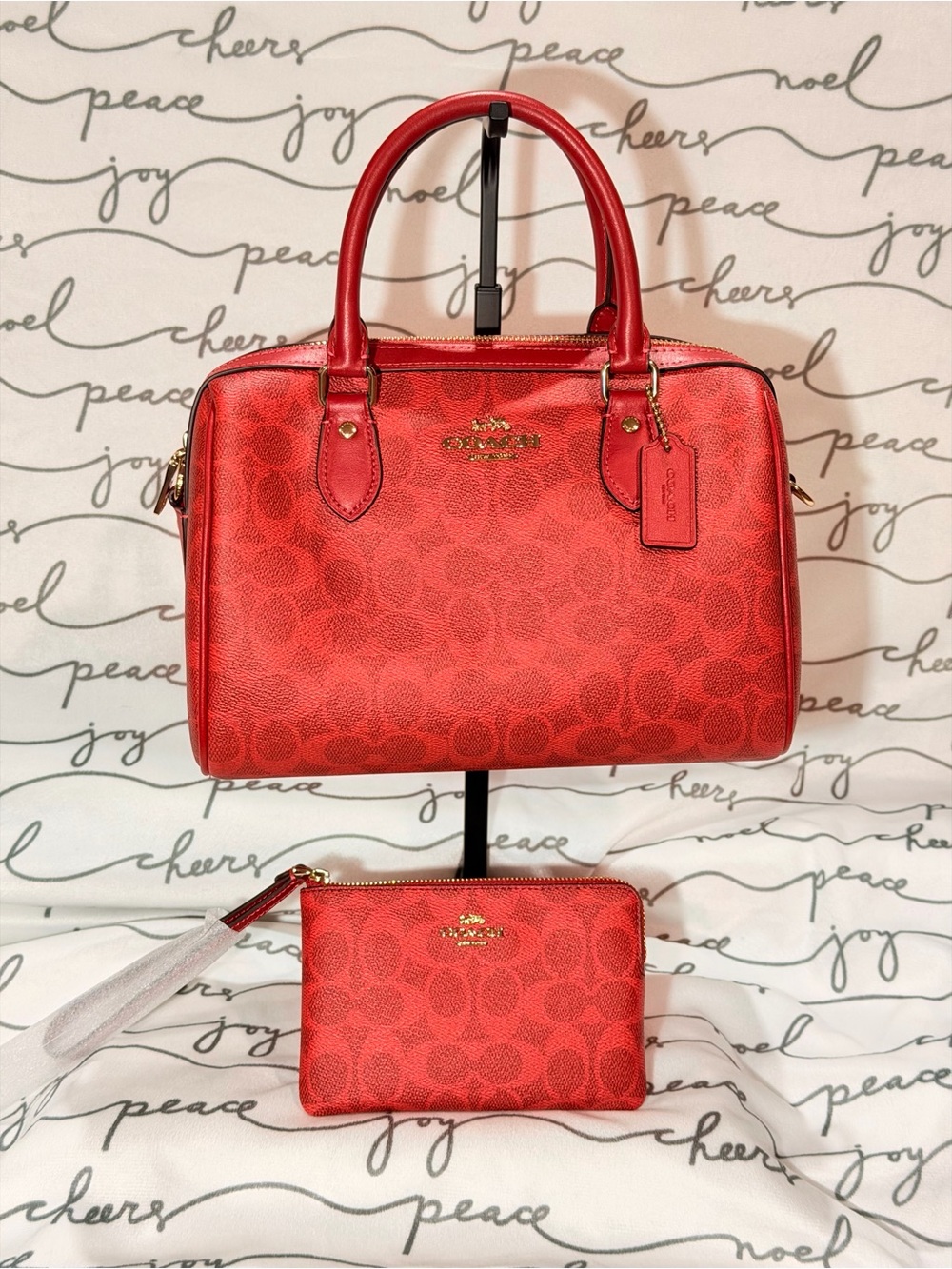 Rowan Satchel Bag
In Signature Canvas Crimson/Gold NWT +
Matching wristlet.